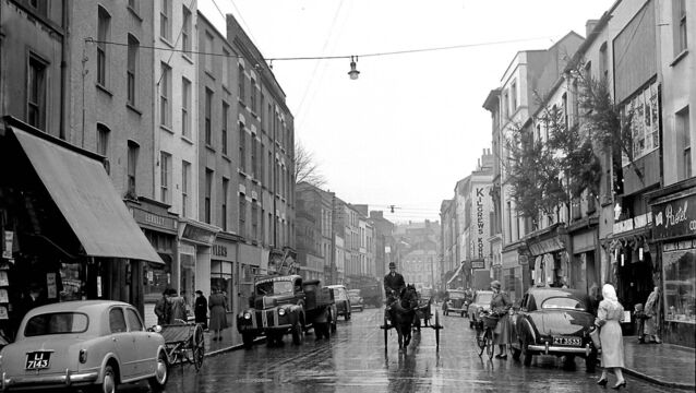 <p class="contextmenu internal_Caption">A wet North Main Street in Cork city in December,1955. Guy’s Directory from 1875 lists all the many shops that occupied the street then</p> <p class="contextmenu internal_Caption">A wet North Main Street in Cork city in December,1955. Guy’s Directory from 1875 lists all the many shops that occupied the street then</p>