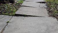 iStock-528914204.jpg Sidewalk Trouble