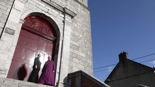 <p>Reverend Meghan Farr, priest in charge at Saint Anne's Shandon, and Bishop of Cork, Cloyne, and Ross, Most Reverend Paul Colton celebrating the renovation work, including the newly-restored 300-year-old front doors. Picture: Clare Keogh </p> <p>Reverend Meghan Farr, priest in charge at Saint Anne's Shandon, and Bishop of Cork, Cloyne, and Ross, Most Reverend Paul Colton celebrating the renovation work, including the newly-restored 300-year-old front doors. Picture: Clare Keogh </p>