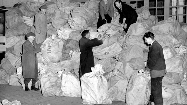 <p>A picture from the archives of post office employees sorting the Christmas mail at the Model School, Cork on December 23, 1955 </p> <p>A picture from the archives of post office employees sorting the Christmas mail at the Model School, Cork on December 23, 1955 </p>