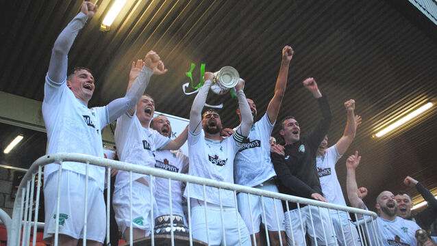 <p>The Coachford A players celebrate after being presented with the AOH Cup following their 4-1 victory over Mallow Town. Picture: Barry Peelo.</p> <p>The Coachford A players celebrate after being presented with the AOH Cup following their 4-1 victory over Mallow Town. Picture: Barry Peelo.</p>