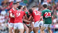 95117_2989964.jpg Colm O'Callaghan and Seán McDonnell tackle Bob Tuohy 27/6/2026