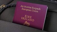 iStock-1194145513.jpg Close up of Ireland Passport in Black Suitcase Pocket
