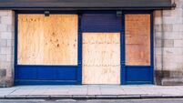 iStock-1205812555.jpg Boarded up shop