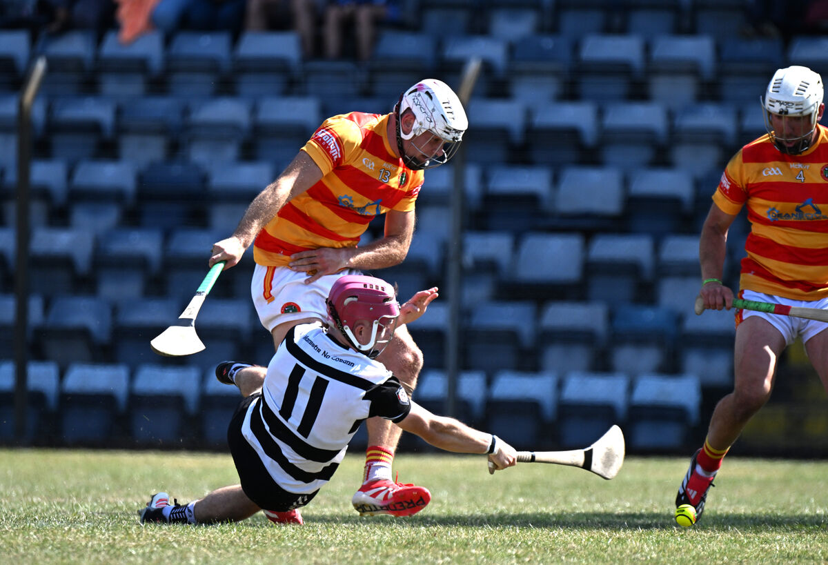 Alex Quirke tries to keep a Midleton attack alive as Gearóid O'Donovan of Newcestown defends. Picture: Larry Cummins Alex Quirke tries to keep a Midleton attack alive as Gearóid O'Donovan of Newcestown defends. Picture: Larry Cummins