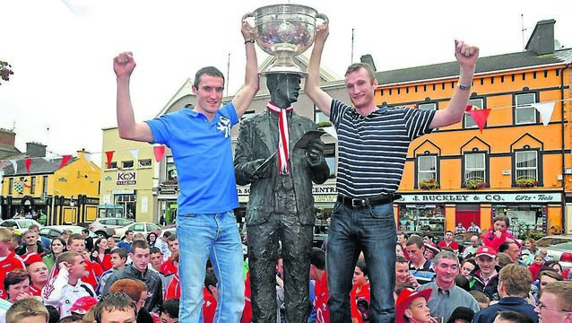<p class="contextmenu internal_Caption">Cork captain Graham Canty and Nicholas Murphy lifting the Sam Maguire Cup high over the statue of Sam Maguire when the then All-Ireland champions visited Dunmanway with the trophy in 2010 - their last victory. Picture Denis Minihane</p> <p class="contextmenu internal_Caption">Cork captain Graham Canty and Nicholas Murphy lifting the Sam Maguire Cup high over the statue of Sam Maguire when the then All-Ireland champions visited Dunmanway with the trophy in 2010 - their last victory. Picture Denis Minihane</p>