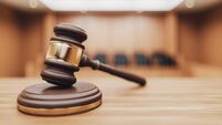 iStock-2232195967.jpg Gavel on a Courtroom Desk