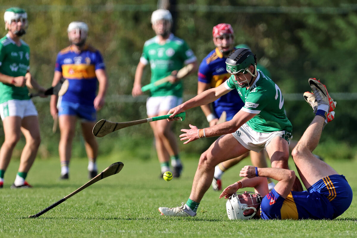 Eanna Desmond, Carrigaline, tackles Darragh O'Mahony, Ballincollig. Picture: Jim Coughlan. Eanna Desmond, Carrigaline, tackles Darragh O'Mahony, Ballincollig. Picture: Jim Coughlan.