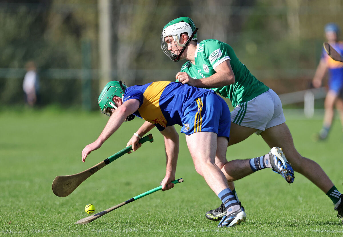 David Stack, Carrigaline, is tackled by Danny Miskella, Ballincollig. Picture: Jim Coughlan. David Stack, Carrigaline, is tackled by Danny Miskella, Ballincollig. Picture: Jim Coughlan.