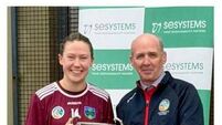 Padraic Treacy chairman Cork Camogie Board presents the Intermedaite Cup to Jillian O Leary Captain Sliabh Rua.jpg Sliabh Rua battle hard to beat Newtownshandrum and win the intermediate camogie title