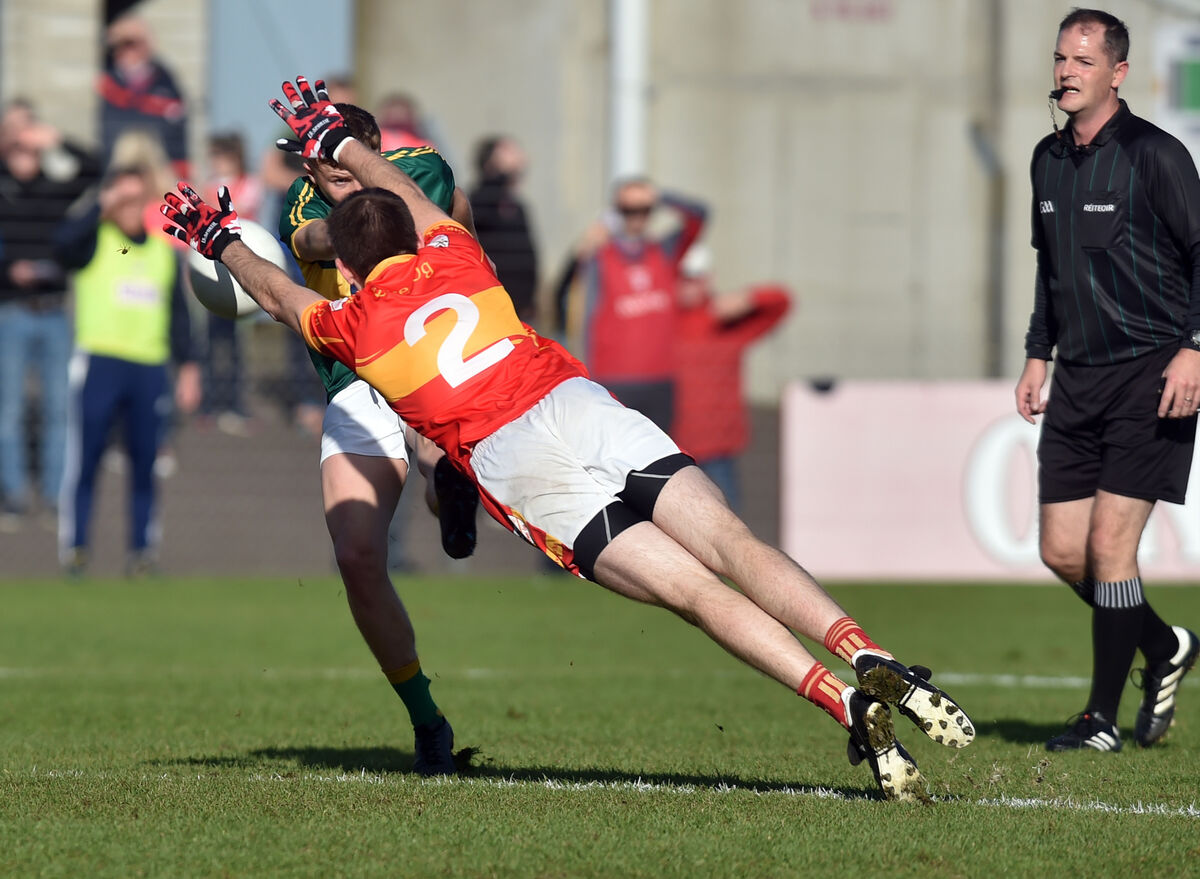 St Michael's Keith Hegarty shoots from Éire Óg's John Kelleher. Picture: Eddie O'Hare St Michael's Keith Hegarty shoots from Éire Óg's John Kelleher. Picture: Eddie O'Hare