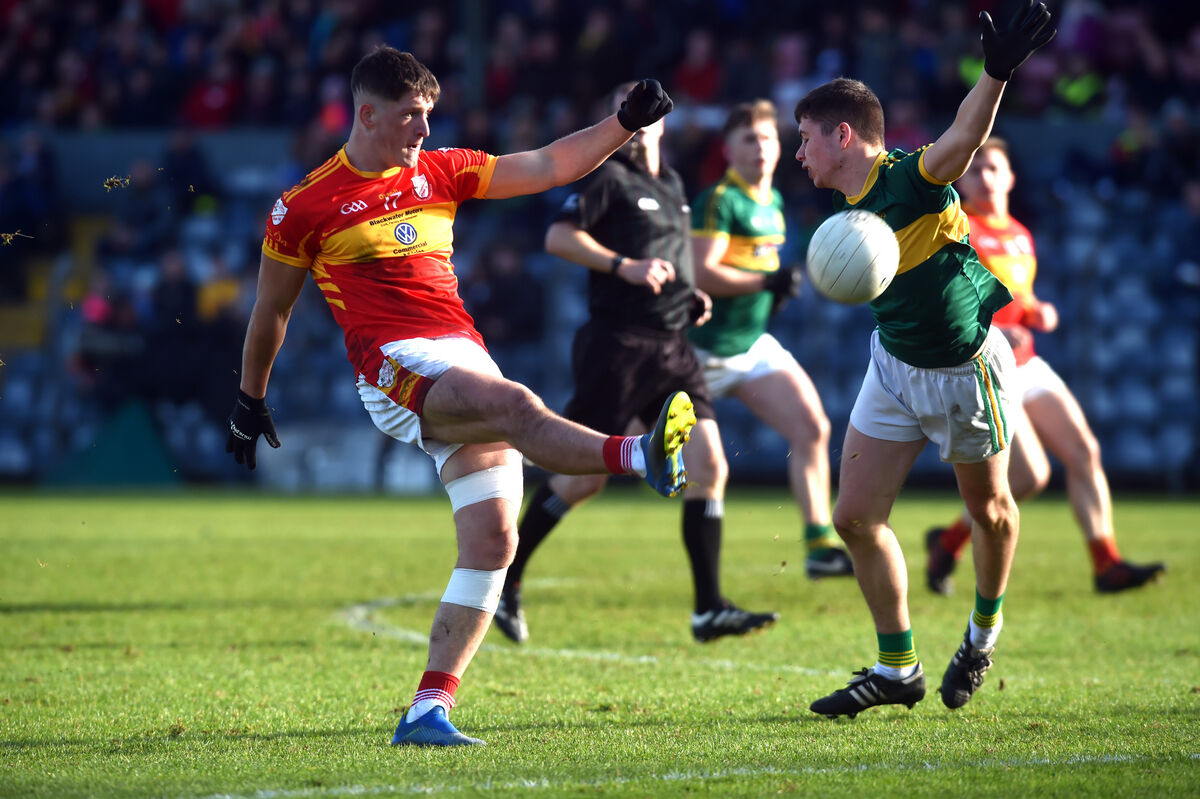 Éire Óg's Colm O'Callaghan goes for a score despite the attentions of St Michael's Diarmuid Cormack. Picture: Eddie O'Hare Éire Óg's Colm O'Callaghan goes for a score despite the attentions of St Michael's Diarmuid Cormack. Picture: Eddie O'Hare