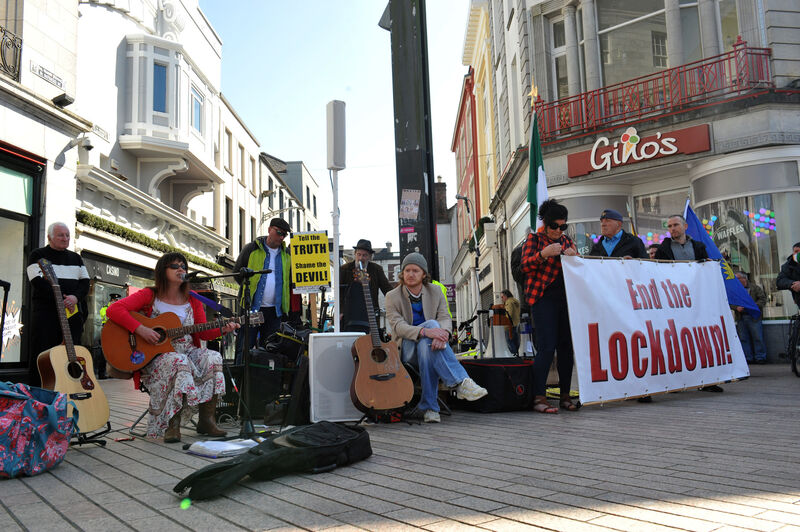Music and songs for the crowds on St Patrick's Street, Cork City for the peaceful Anti-Lockdown protest rally. Picture: Larry Cummins Music and songs for the crowds on St Patrick's Street, Cork City for the peaceful Anti-Lockdown protest rally. Picture: Larry Cummins