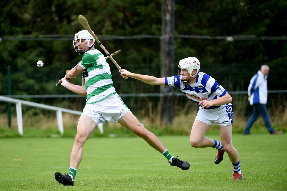 Corner-back Eoghan Delaney, Valley Rovers makes a clearance as Michael O'Connell, Inniscarra attempts to block the shot. Pic: Larry Cummins. Corner-back Eoghan Delaney, Valley Rovers makes a clearance as Michael O'Connell, Inniscarra attempts to block the shot. Pic: Larry Cummins.