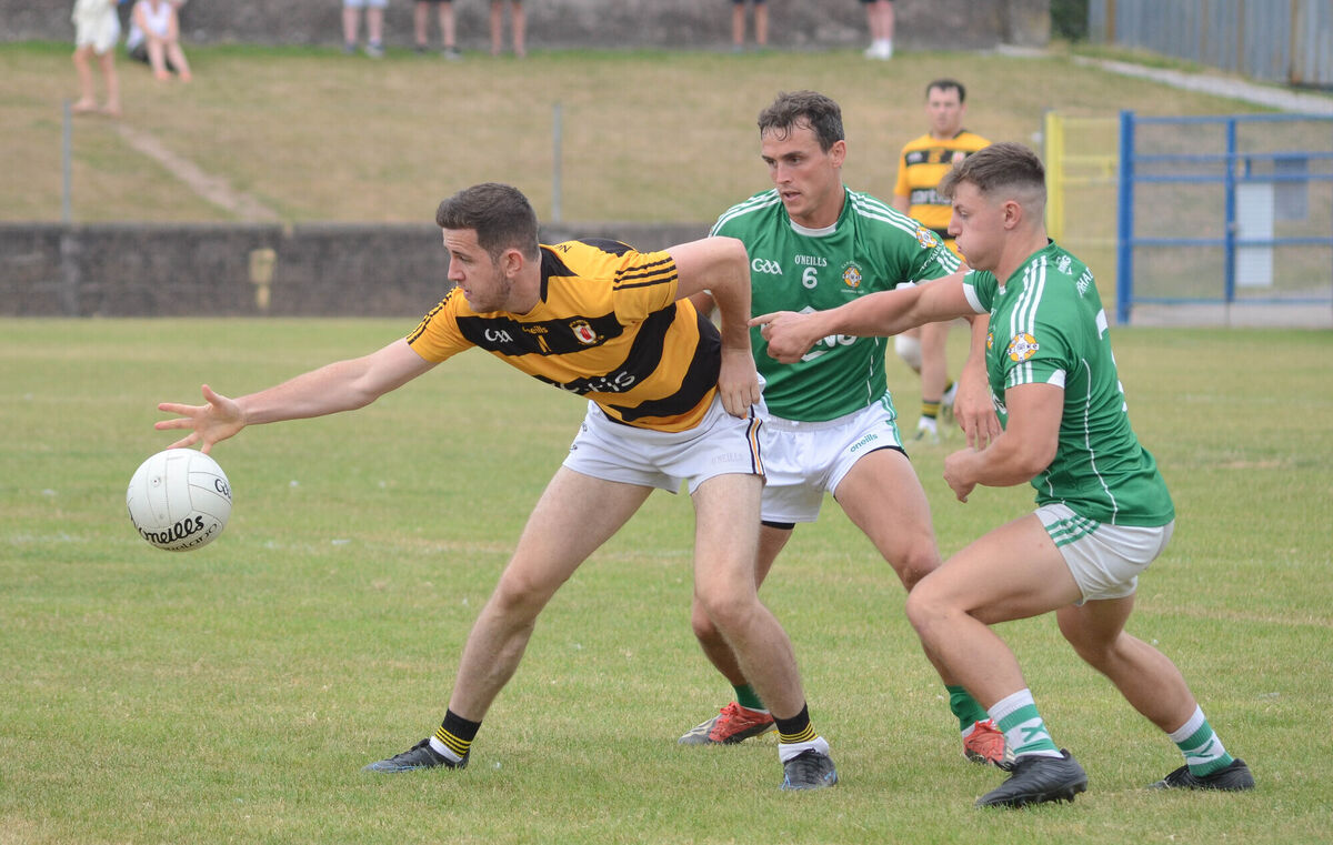 Na Piarsaigh's reaches out for the ball ahead of Aghada's Jake O'Donoghue and Kyle O'Shea during the recent PIFC match in Carrigtwohill. Picture: Howard Crowdy Na Piarsaigh's reaches out for the ball ahead of Aghada's Jake O'Donoghue and Kyle O'Shea during the recent PIFC match in Carrigtwohill. Picture: Howard Crowdy