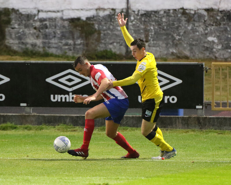 Marc Ludden, Treaty United, under pressure from James O'Leary, Cobh Ramblers. Picture: Brendan Gleeson. Marc Ludden, Treaty United, under pressure from James O'Leary, Cobh Ramblers. Picture: Brendan Gleeson.