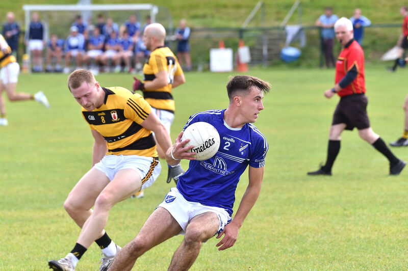 Seth Thornton, Bantry, getting away from Evan Sheehan, Na Piarsaigh. Picture: Dan Linehan Seth Thornton, Bantry, getting away from Evan Sheehan, Na Piarsaigh. Picture: Dan Linehan