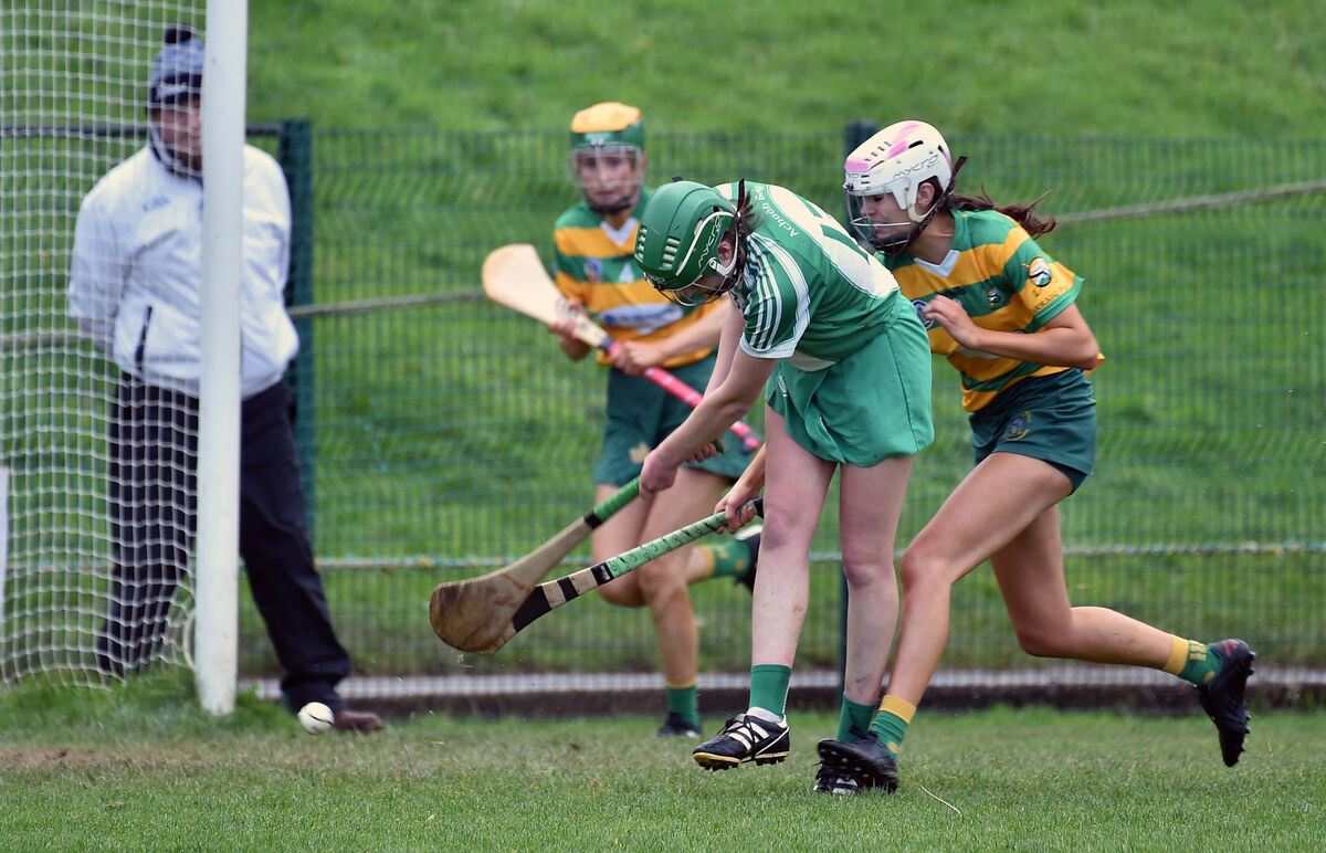Cliona Healy, Aghabullogue, fires home her goal past Blackrock defenders Kate O'Brien and Anna Lucey. Picture: Dan Linehan Cliona Healy, Aghabullogue, fires home her goal past Blackrock defenders Kate O'Brien and Anna Lucey. Picture: Dan Linehan
