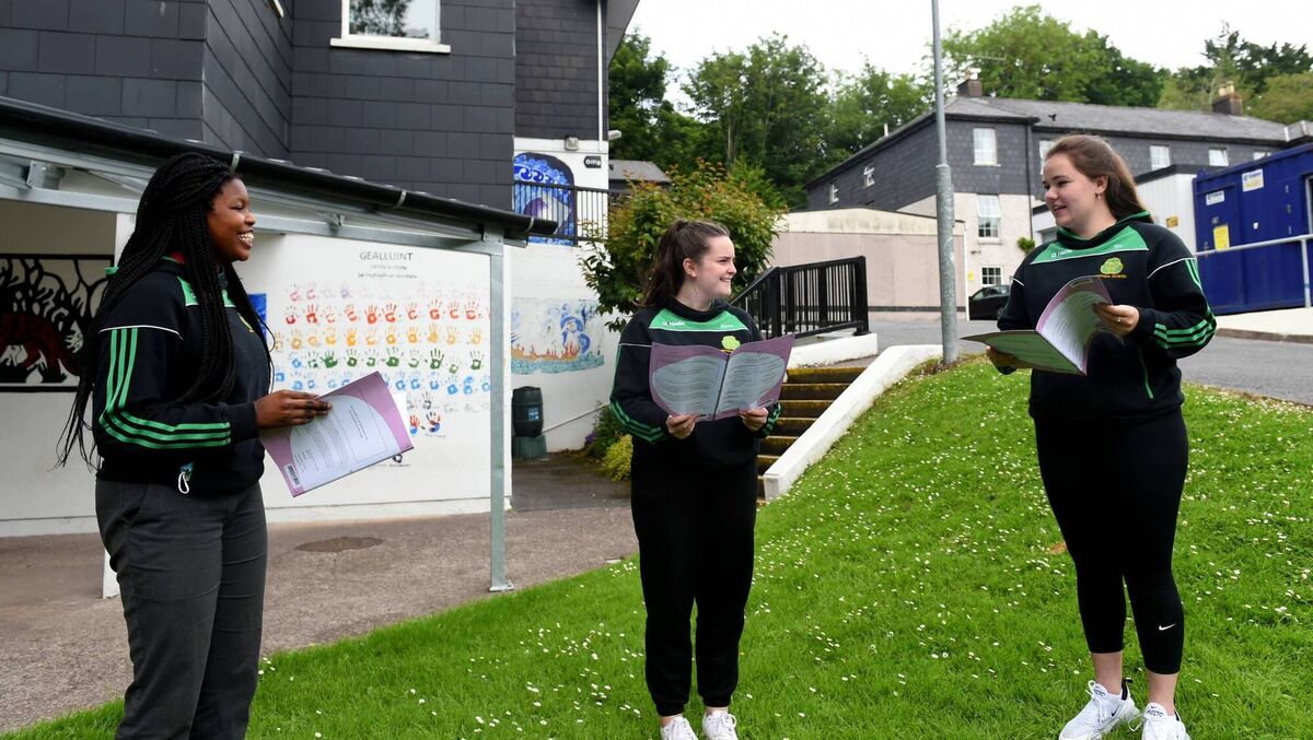 Muirin Abimbola, Maeve Ní Chróinín, and Eilis Ní Bhreacáin, students of Coláiste an Phiarsaigh, pictured in 2021 after sitting their Leaving Certificate French exams. Muirin Abimbola, Maeve Ní Chróinín, and Eilis Ní Bhreacáin, students of Coláiste an Phiarsaigh, pictured in 2021 after sitting their Leaving Certificate French exams.
