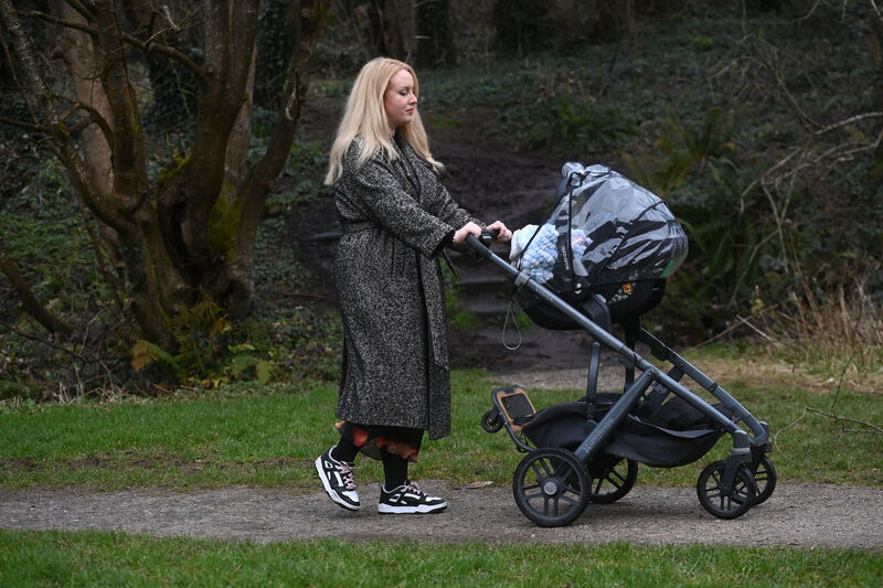 Julia Duff walking in The Glen River Park with her infant son Rian. Pic Larry Cummins Julia Duff walking in The Glen River Park with her infant son Rian. Pic Larry Cummins