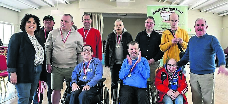 Cllr Mary Rose and Cllr Terry Shannon with the kurling teams from the Brook Centre and Praxis Care at the competition. Cllr Mary Rose and Cllr Terry Shannon with the kurling teams from the Brook Centre and Praxis Care at the competition.