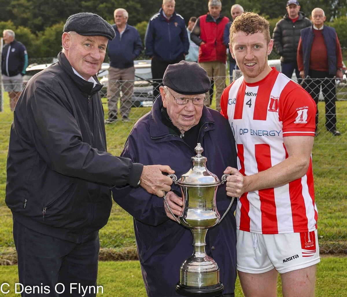 Colman and Michael Abernethy present the Abernethy Cup to Imokilly captain Ciaran O'Brien. Picture: Denis O'Flynn Colman and Michael Abernethy present the Abernethy Cup to Imokilly captain Ciaran O'Brien. Picture: Denis O'Flynn
