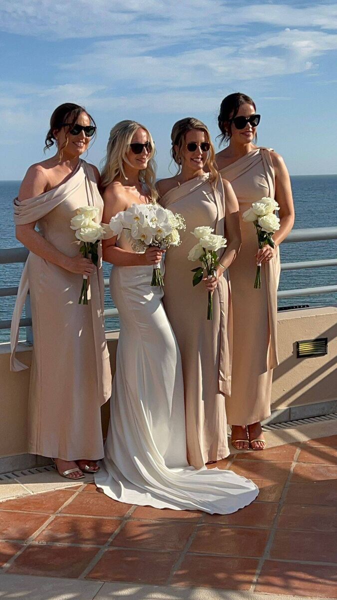 Bride Karen Cronin with her bridal party, Ali Cronin (Maid of Honour and sister) Jen Cronin (bridesmaid and sister), and Sarah Reid. Bride Karen Cronin with her bridal party, Ali Cronin (Maid of Honour and sister) Jen Cronin (bridesmaid and sister), and Sarah Reid.