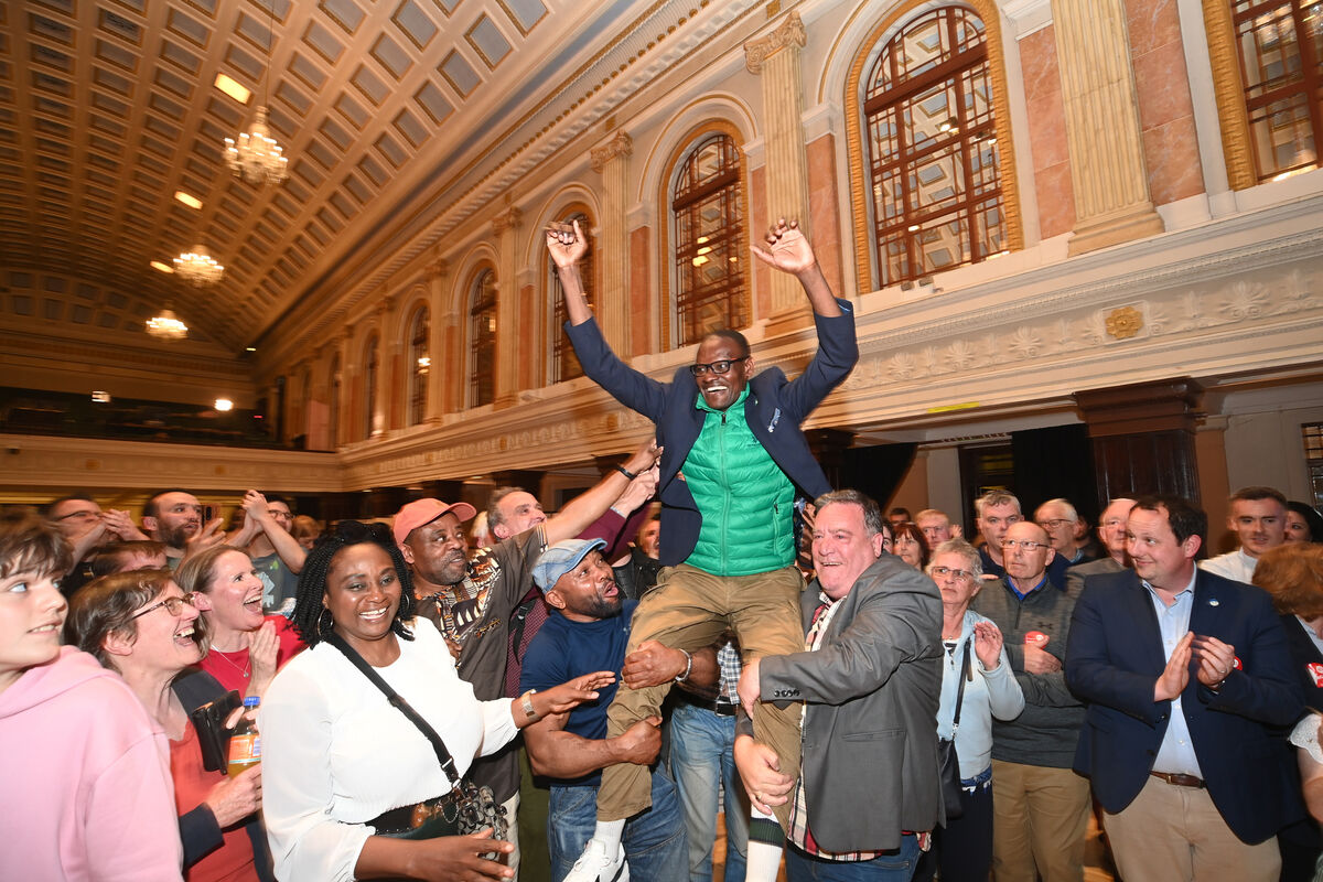 Honore Kamegni, Green Party, celebrates his election at the local election count centre at City Hall. Picture: Larry Cummins Honore Kamegni, Green Party, celebrates his election at the local election count centre at City Hall. Picture: Larry Cummins