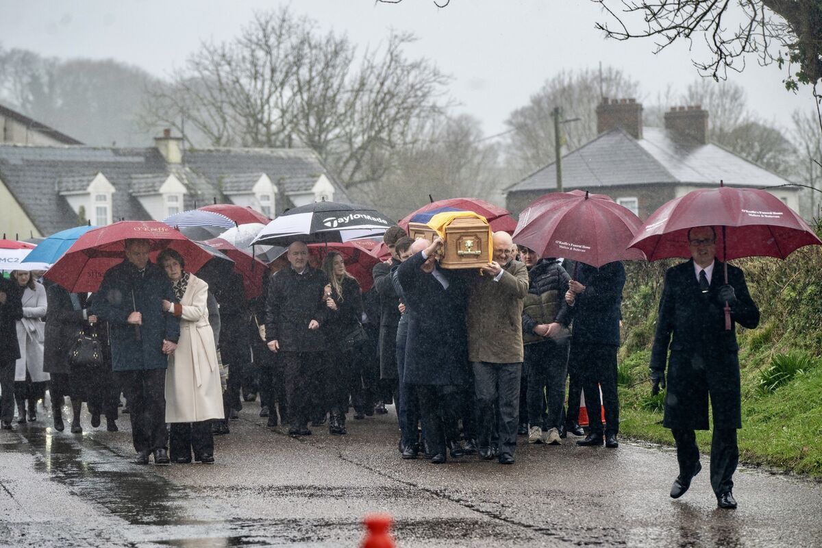 Friends and family carry the coffin of Michael O'Sullivan’s during his funeral procession in Lombardstown, Co Cork. Picture Chani Anderson Friends and family carry the coffin of Michael O'Sullivan’s during his funeral procession in Lombardstown, Co Cork. Picture Chani Anderson
