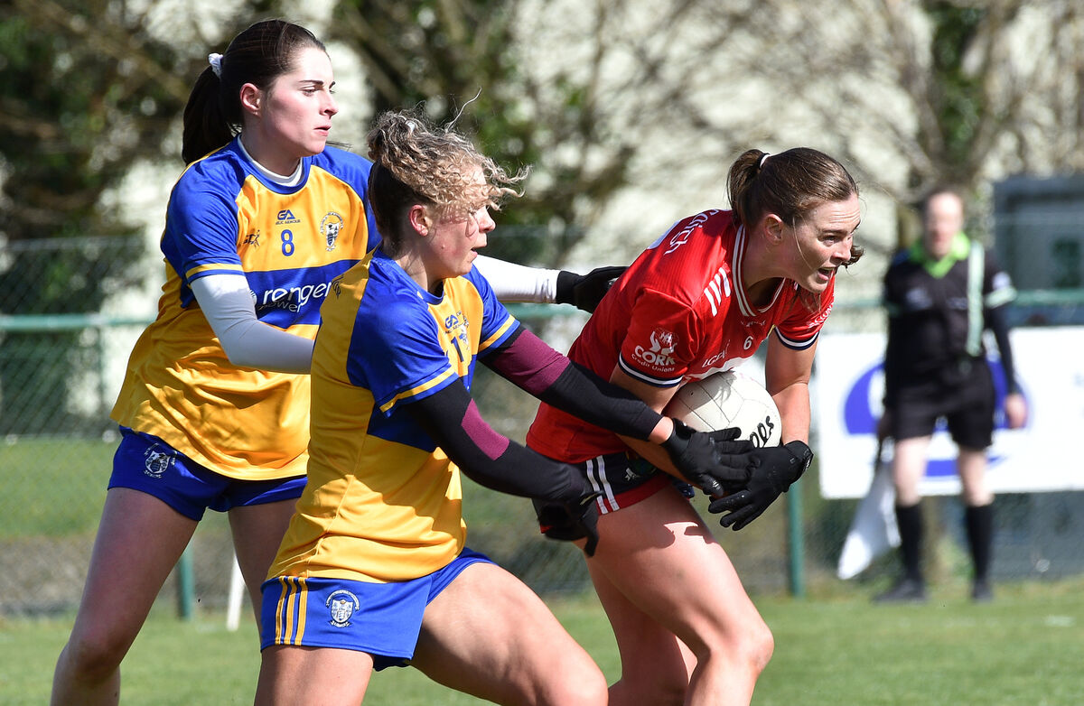 Shauna Cronin, Cork, is tackled by Clare players Caoimhe Harvey and Megan Downes during their league clash at Ballyvourney. Picture: Dan Linehan Shauna Cronin, Cork, is tackled by Clare players Caoimhe Harvey and Megan Downes during their league clash at Ballyvourney. Picture: Dan Linehan