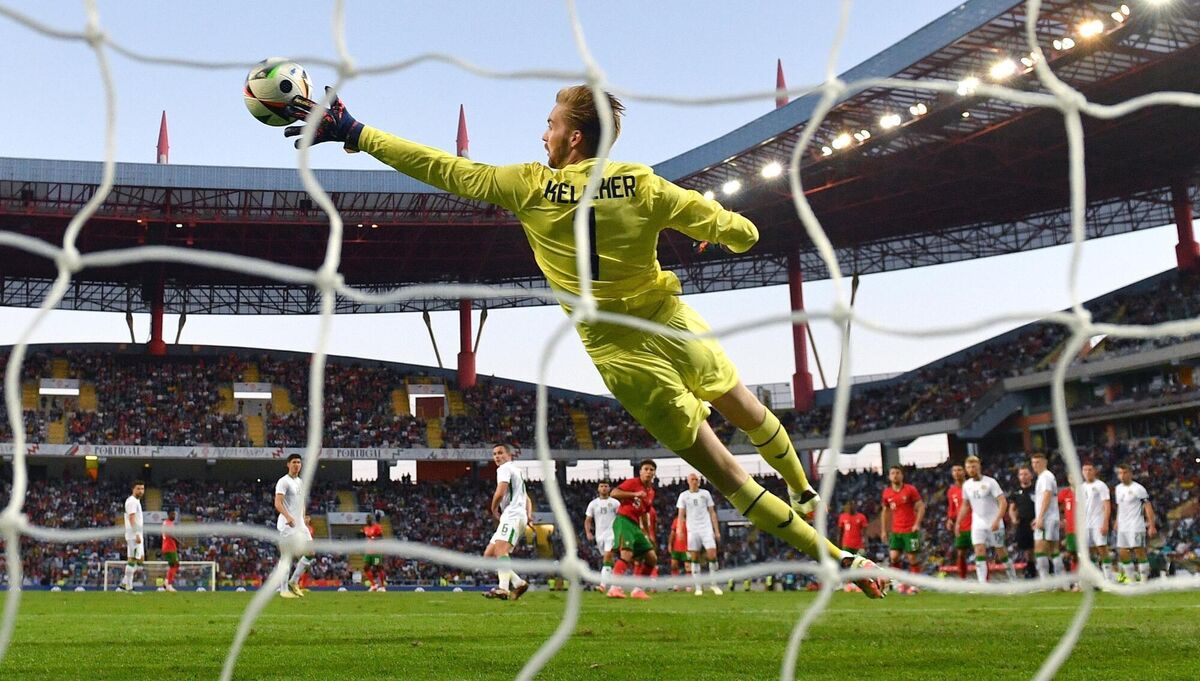 Republic of Ireland goalkeeper Caoimhin Kelleher makes a save from Joao Neves of Portugal during the international friendly match between the sides at Estádio Municipal de Aveiro in Aveiro, Portugal last year. Picture Stephen McCarthy/Sportsfile Republic of Ireland goalkeeper Caoimhin Kelleher makes a save from Joao Neves of Portugal during the international friendly match between the sides at Estádio Municipal de Aveiro in Aveiro, Portugal last year. Picture Stephen McCarthy/Sportsfile