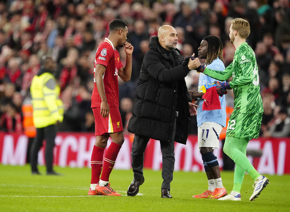 Manchester City manager Pep Guardiola shakes hands with Liverpool goalkeeper Caoimhin Kelleher during the Premier League match at Anfield, Liverpool. Picture: Peter Byrne/PA Wire Manchester City manager Pep Guardiola shakes hands with Liverpool goalkeeper Caoimhin Kelleher during the Premier League match at Anfield, Liverpool. Picture: Peter Byrne/PA Wire