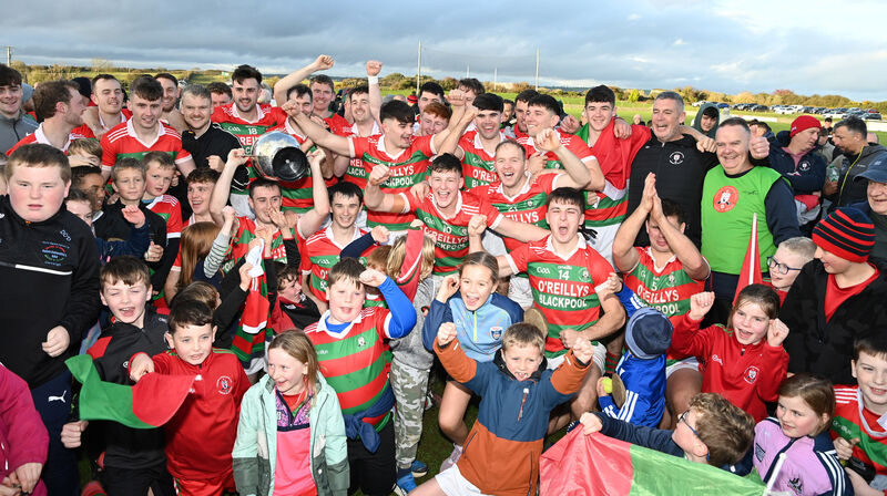 Carrig Na BhFear captain Tadhg O'Donoghue and players and supporters with the Jim Ryan cup after defeating Erin's Own in the Michael O'Connor Motor Factors East Cork J'A'FC final at Ballinacurra. Picture; Eddie O'Hare Carrig Na BhFear captain Tadhg O'Donoghue and players and supporters with the Jim Ryan cup after defeating Erin's Own in the Michael O'Connor Motor Factors East Cork J'A'FC final at Ballinacurra. Picture; Eddie O'Hare