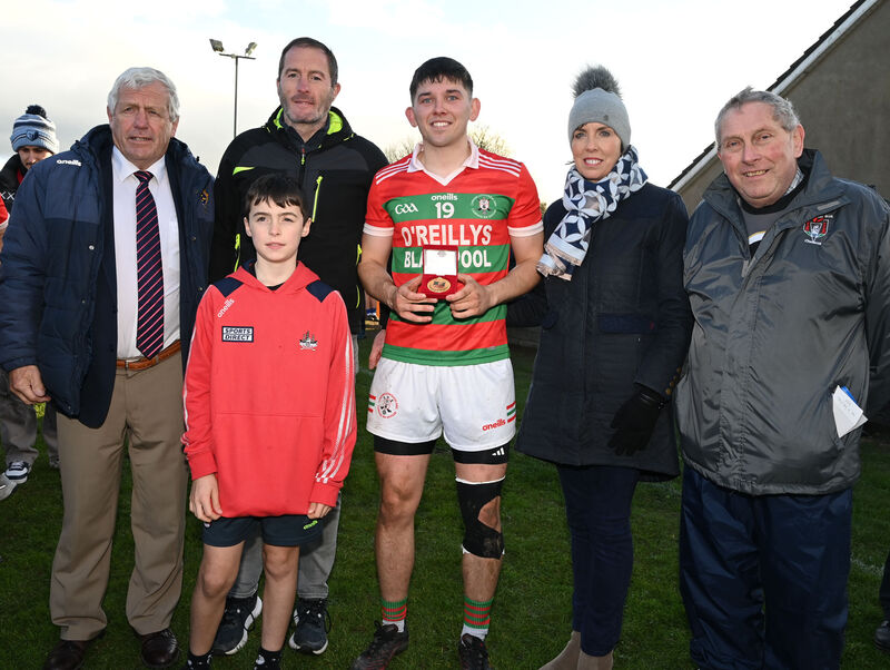 Carrig Na BhFear's Billy Connolly with the 'man of the match ' commemorative Eamon Ryan medal with Avril Geary chairperson and Jerry O'Sullivan president East Cork, with Jim, Des and Cullen Ryan after defeating Erin's Own in the Michael O'Connor Motor Factors East Cork J'A'FC final at Ballinacurra. Picture; Eddie O'Hare Carrig Na BhFear's Billy Connolly with the 'man of the match ' commemorative Eamon Ryan medal with Avril Geary chairperson and Jerry O'Sullivan president East Cork, with Jim, Des and Cullen Ryan after defeating Erin's Own in the Michael O'Connor Motor Factors East Cork J'A'FC final at Ballinacurra. Picture; Eddie O'Hare