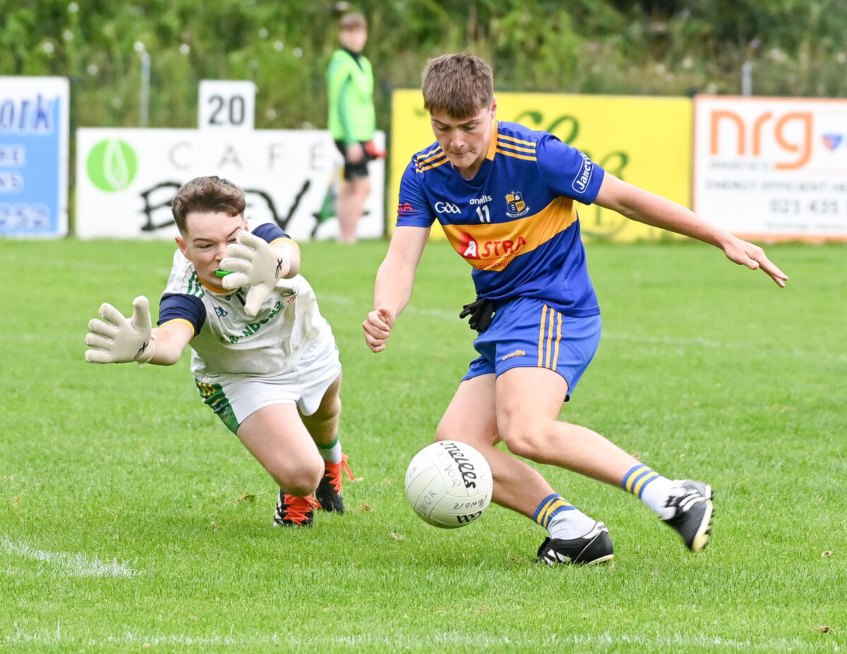 Carrigaline's Eoghan Ahern shoots under pressure from Glanmire's Zach Deane last year. Picture: David Keane Carrigaline's Eoghan Ahern shoots under pressure from Glanmire's Zach Deane last year. Picture: David Keane